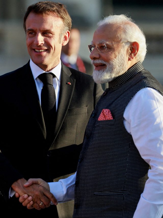 FILE PHOTO: French President Macron and Indian Prime Minister Modi arrive to a dinner held at the Louvre in Paris