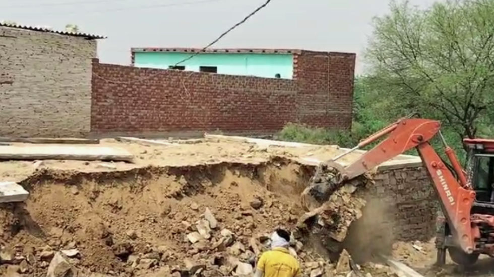 In Morena, bulldozer ran into the house of the accused who kept beef in their house.