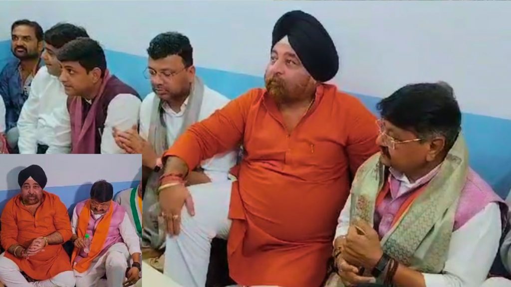 Congress city president Surjeet Singh Chadha and workers with minister Kailash Vijayawagiya.