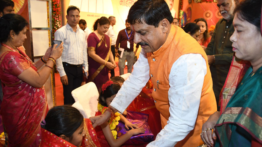 Chief Minister Dr. Mohan Yadav celebrating the festival with Sarpanch sisters.