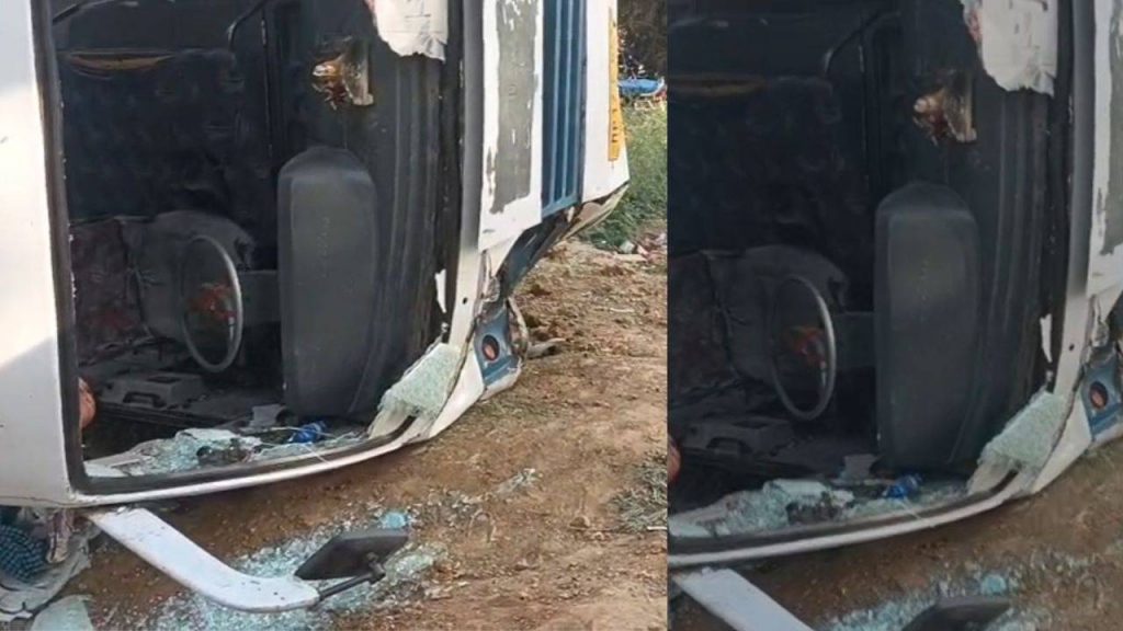 Two youths died in a collision between a bus and a bike.