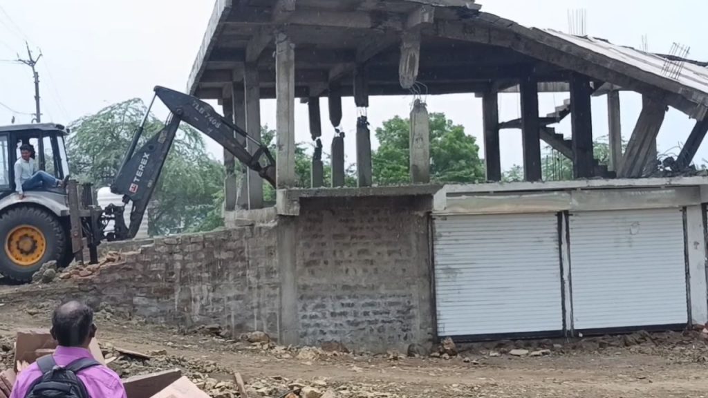 In Bhopal, a bulldozer was used to demolish illegal construction done on government land worth Rs 5 crore.