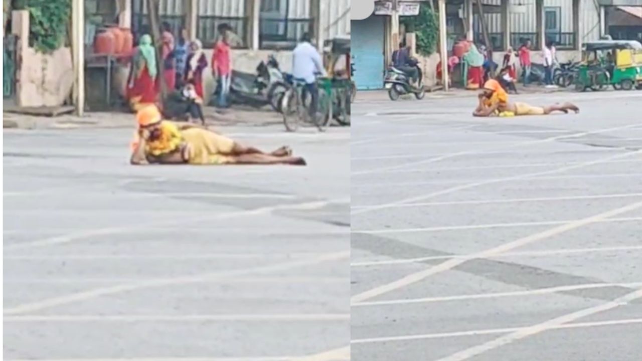 A person did yoga in the middle of the intersection in Indore.