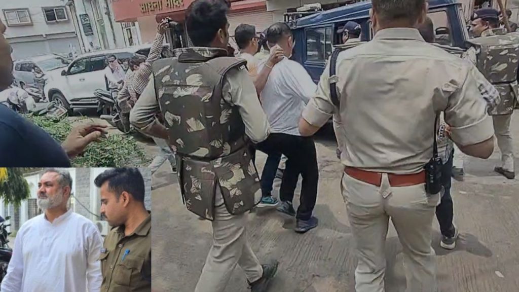 Police taking Anwar Qadri from court to the police station.