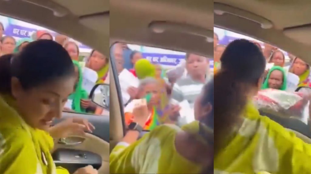 Alka Lamba distributing sarees and caps during the Voter Rights Yatra.