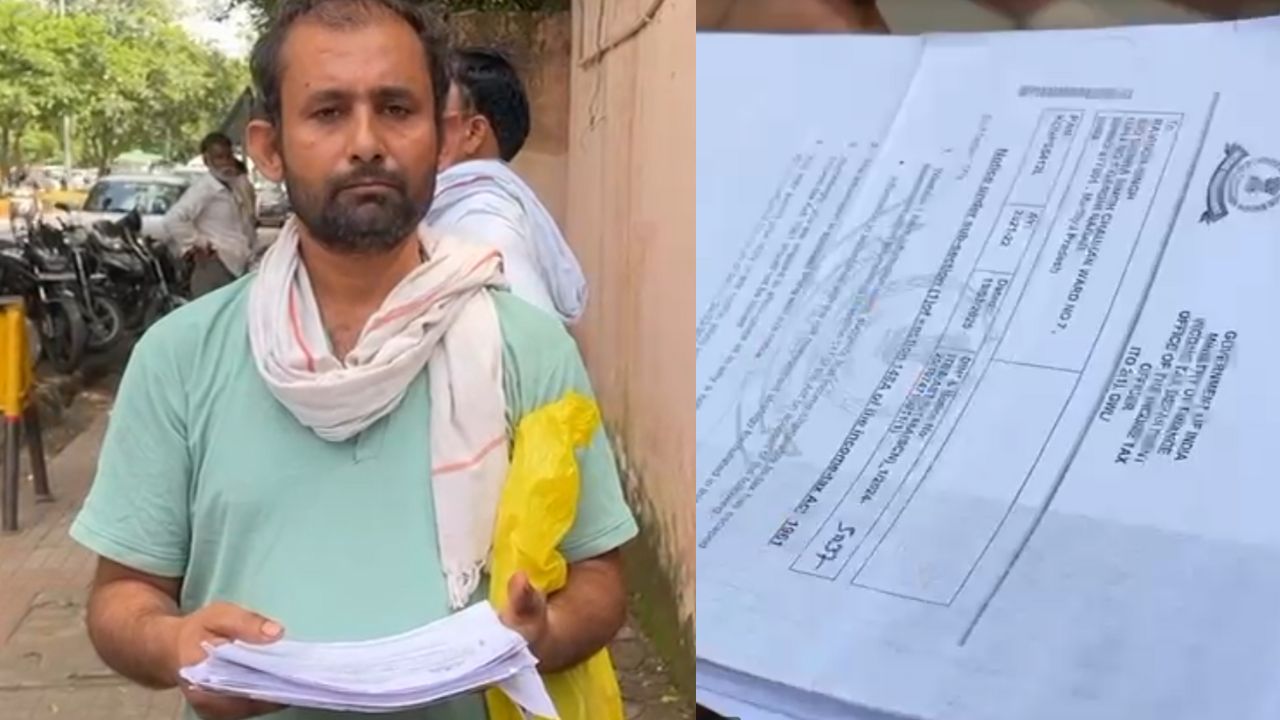 young man holding a notice in his hand