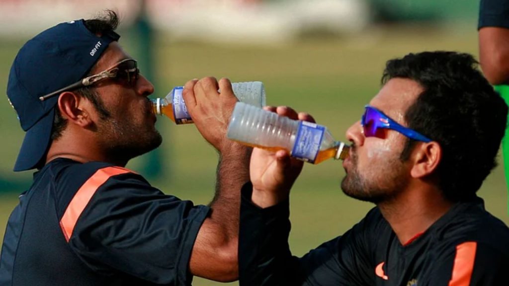 Cricketers drinking water