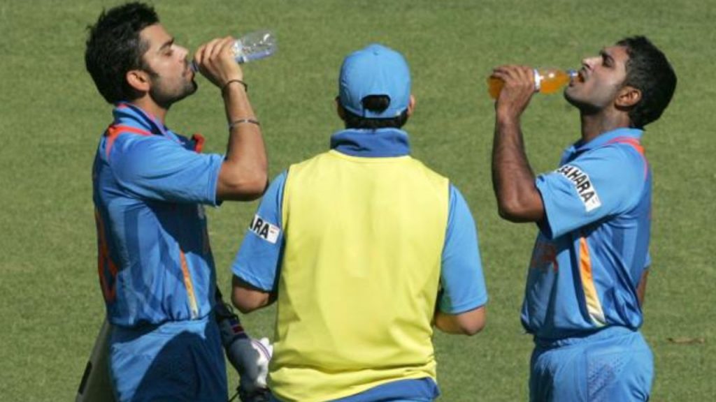 Cricketers drinking water