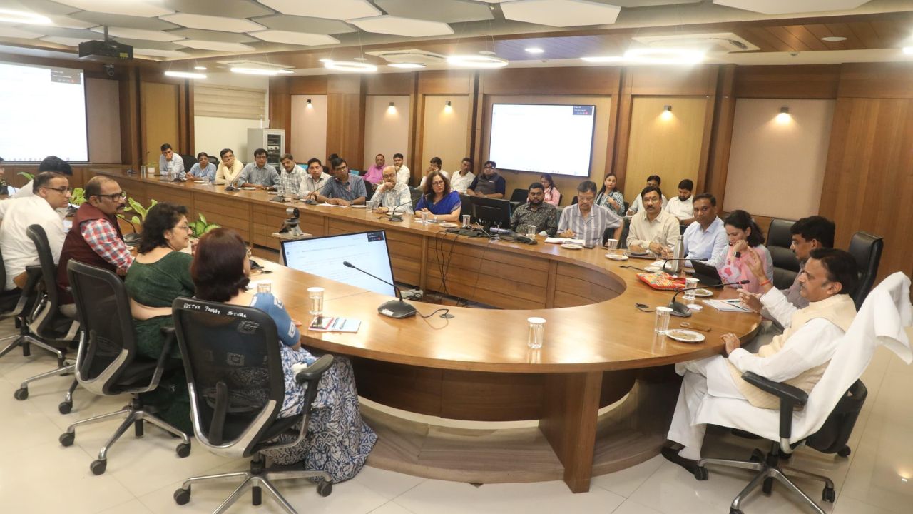 Deputy CM Rajendra Shukla holding a meeting with officials.