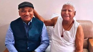 RJD leader Sunil Kumar Singh with Lalu Yadav (File Photo)