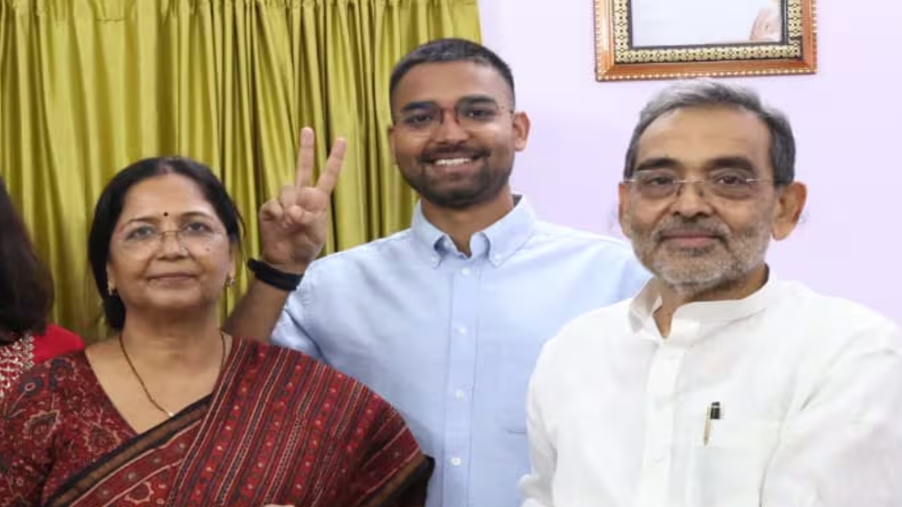 Upendra Kushwaha with his son and wife