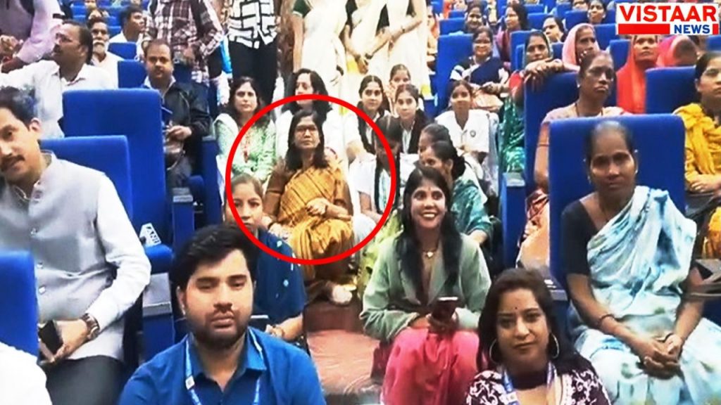 MP Foundation Day Gwalior Collector Ruchika Chouhan sits on floor with students