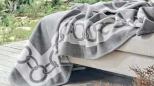 People buying blankets sold by weight in MP winter market