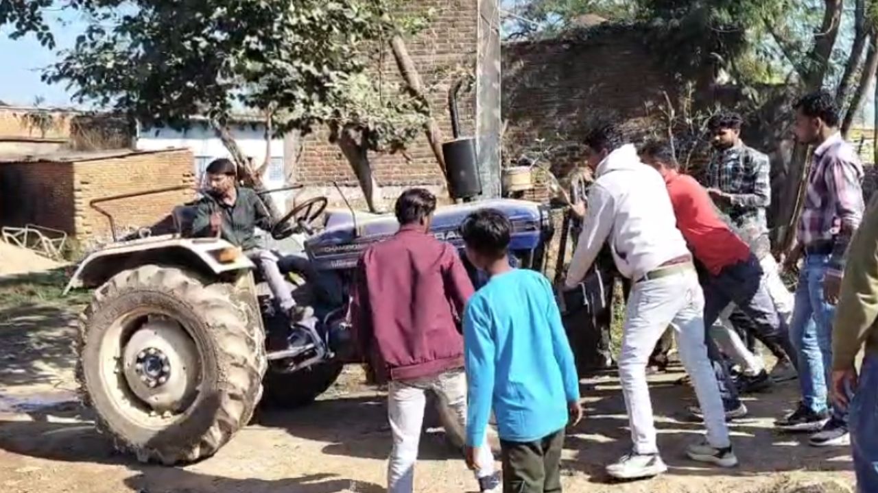 Due to outstanding electricity bill, the department employees took away the farmer's tractor.