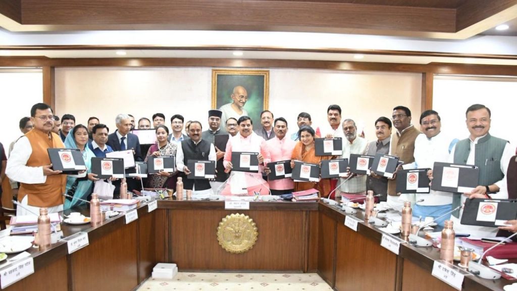 The Chief Minister and cabinet ministers arrived at the cabinet meeting carrying tablets.