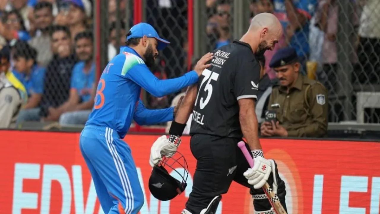 Virat Kohli and Daryl Mitchell