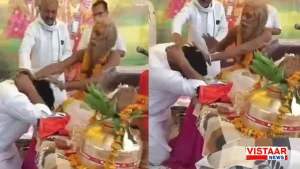 Sant Sitaram punched BJP MLA Pradeep Agarwal.