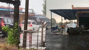 Due to heavy rain and storm in Seoni, the tin shed of a shop was blown away.