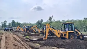 Bulldozer action to remove encroachment from forest in Khandwa.