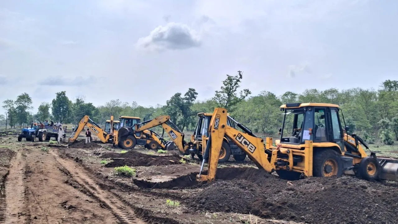Bulldozer action to remove encroachment from forest in Khandwa.