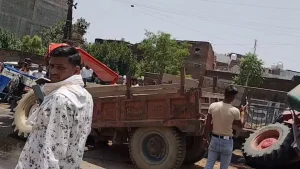 Tractors loaded with illegal sand collided with each other