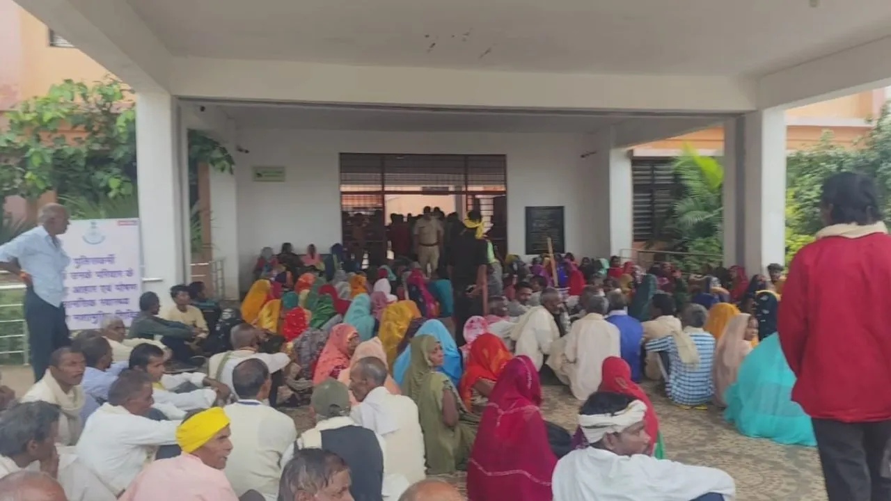 Homeless tribal families reach the Collectorate.