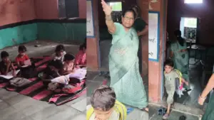 A teacher escorting children out of the classroom.