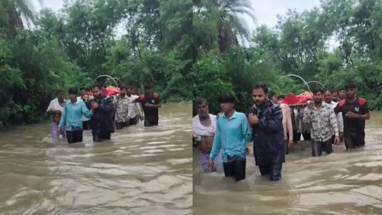 Villagers crossing the bridge for the funeral procession.