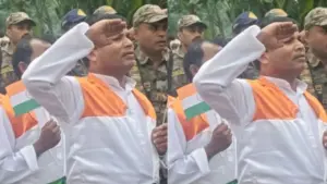 Former Naxalite Surendra saluting the national flag, with Deepak on the left.