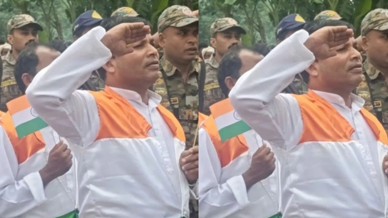 Former Naxalite Surendra saluting the national flag, with Deepak on the left.