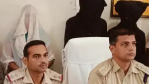 Three arrested, including wife.