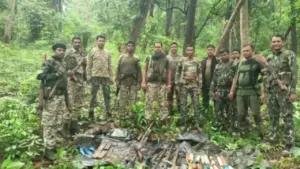 Security forces with a Naxal dump
